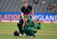 BRISTOL, ENGLAND - JULY 18: England batsman Anya Shrubsole goes over to console South Africa captain Dane van Niekerk during the ICC Women's World Cup 2017 Semi-Final between England and South Africa at The County Ground on July 18, 2017 in Bristol, England. (Photo by Stu Forster/Getty Images)